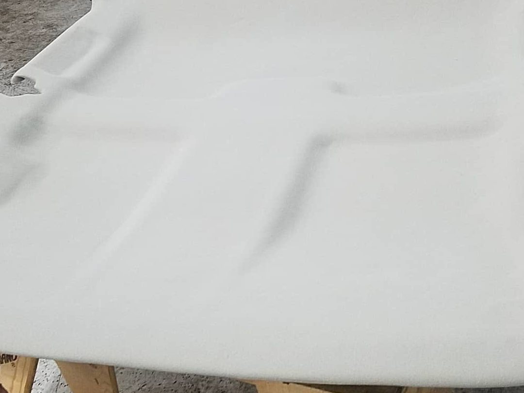 Headliner board recovered in new fabric